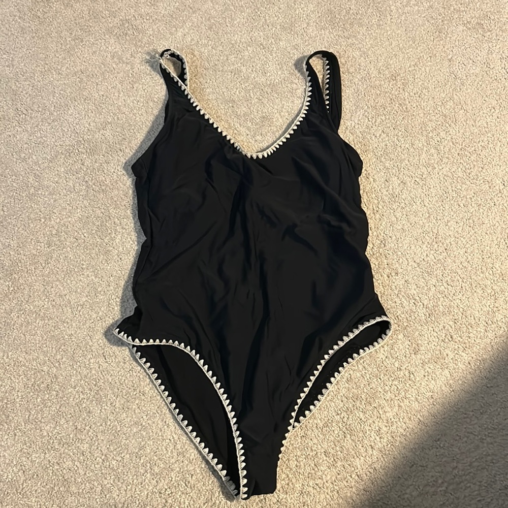One piece open back bathing suit